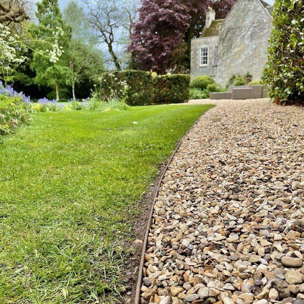 Steel Gravel Edging marking path up to home